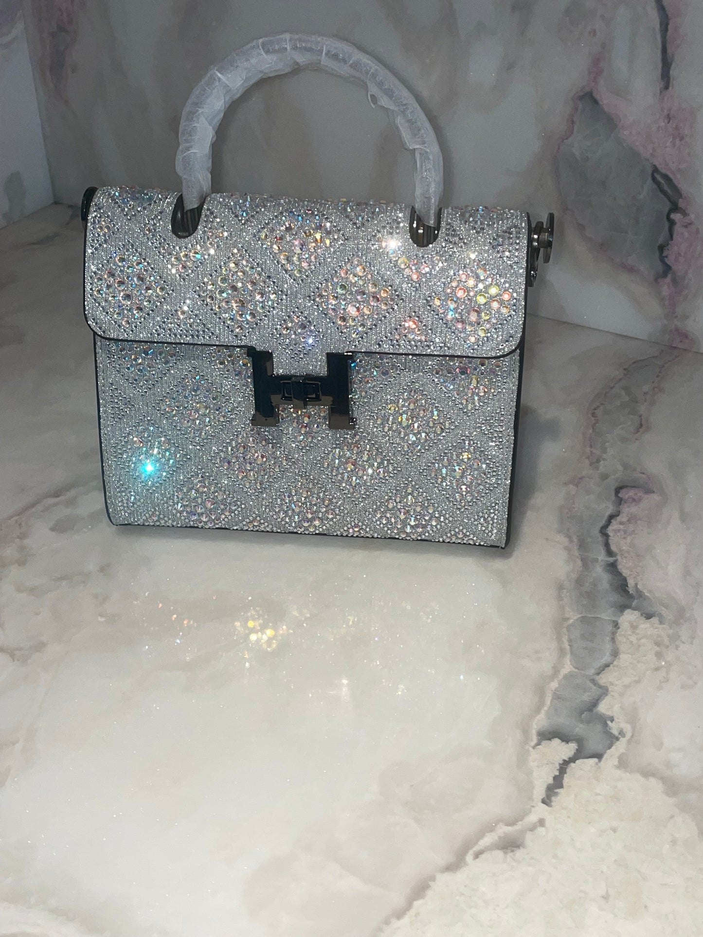 Swarovski Crystal H clutch.