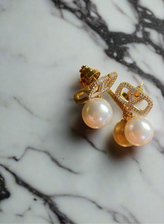 Assorted logo earrings and jewelry sets