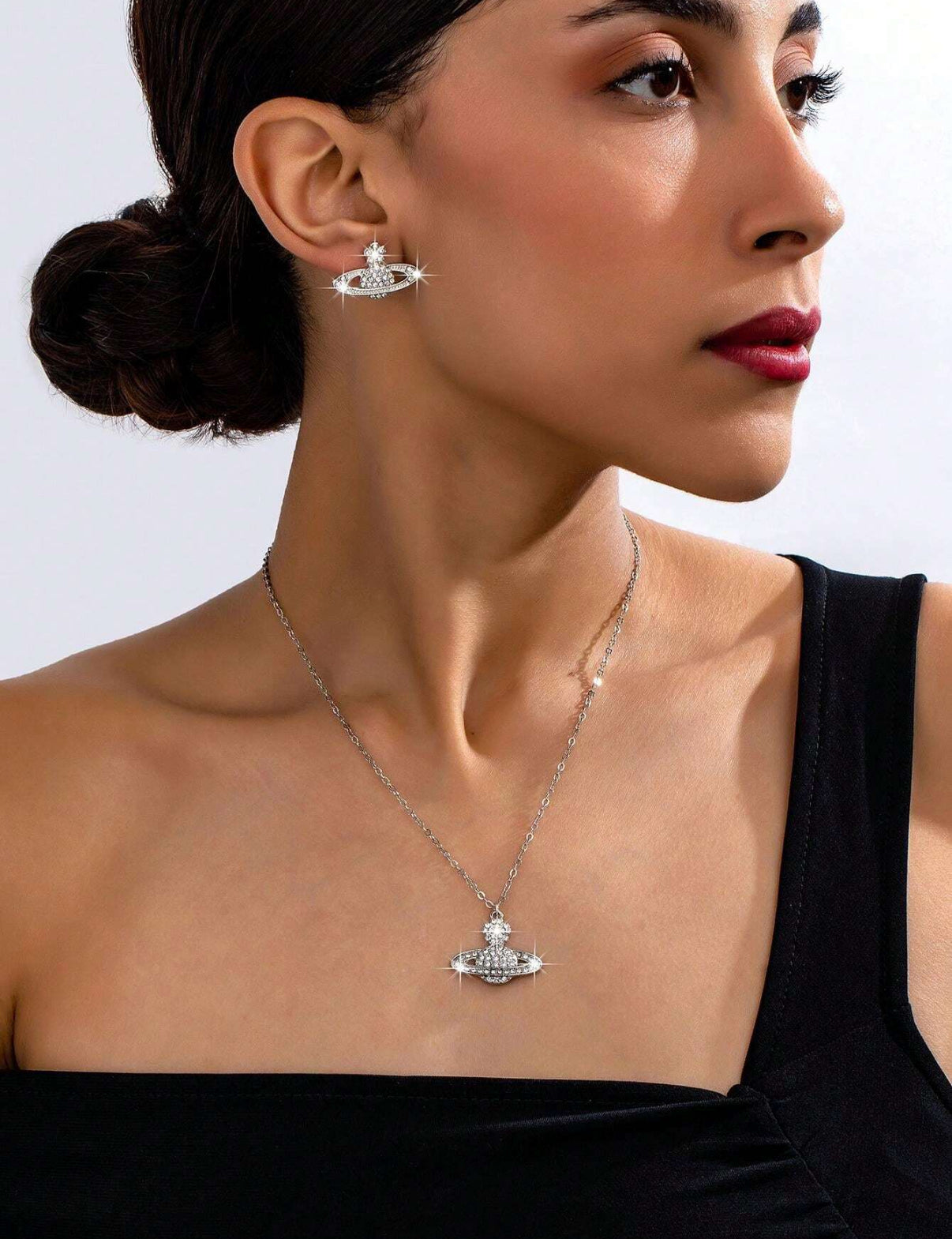 Assorted logo earrings and jewelry sets