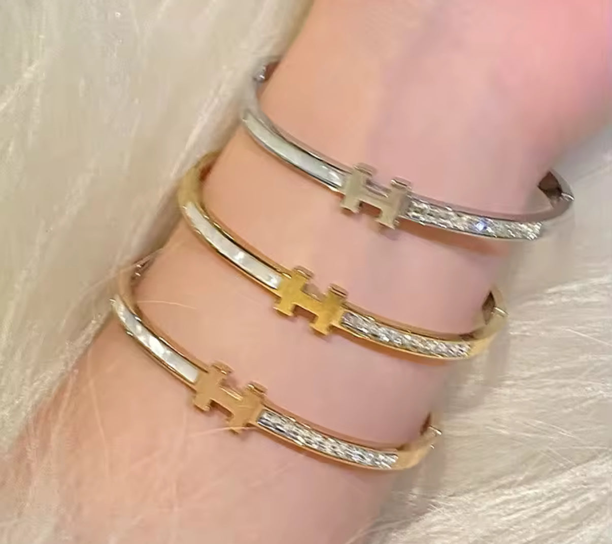 H bangle bracelets. (Variety)