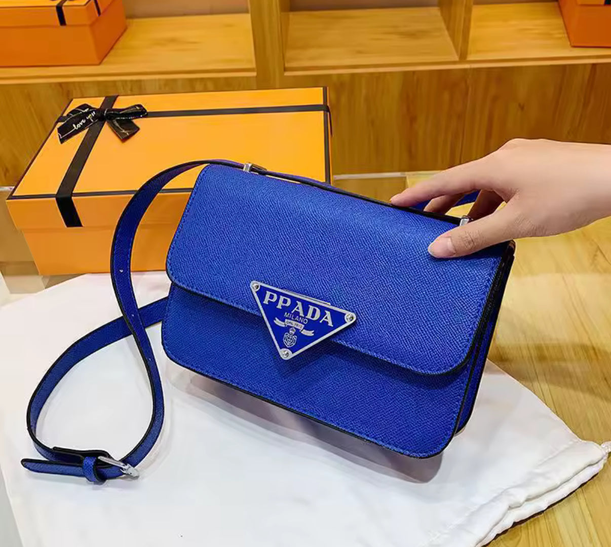 Small colorful crossbody flap bags with triangle logo snap closure