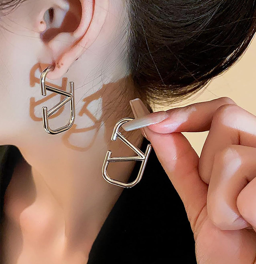 Assorted logo earrings and jewelry sets
