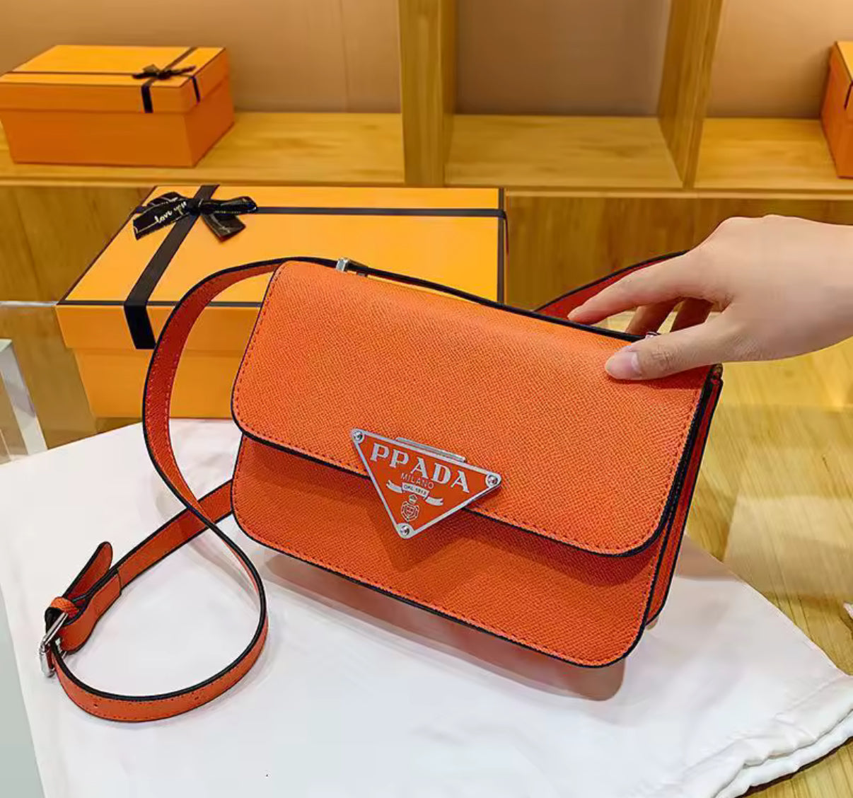 Small colorful crossbody flap bags with triangle logo snap closure