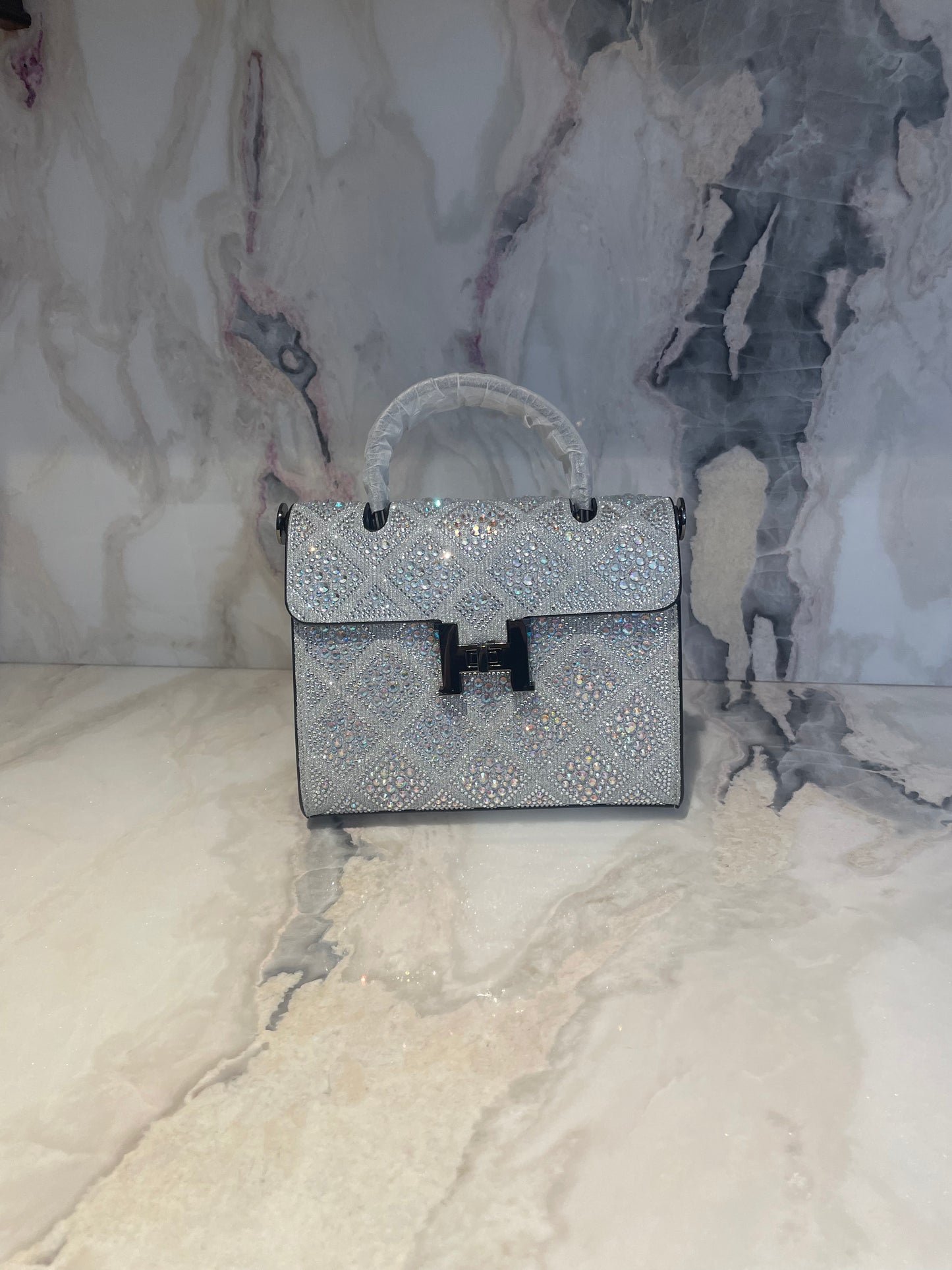 Swarovski Crystal H clutch.