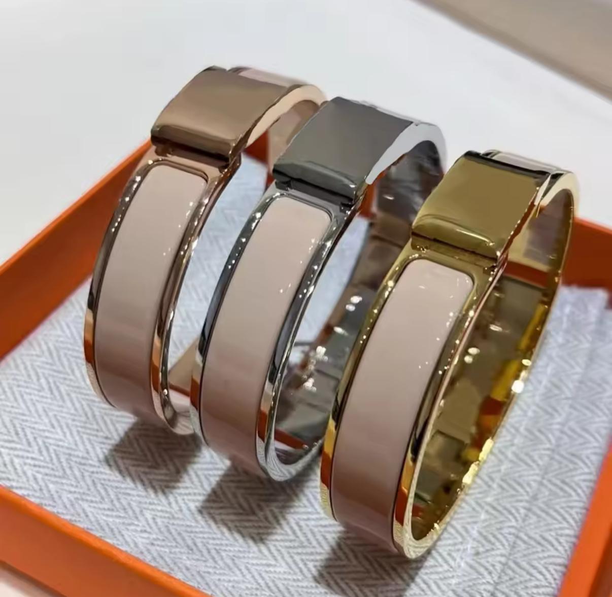 Thick band letter H bangle