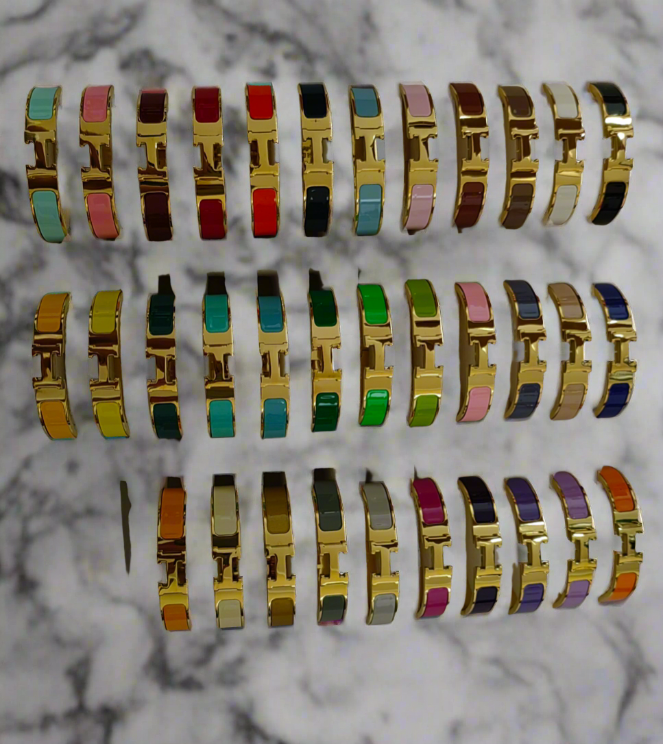 Thick band letter H bangle