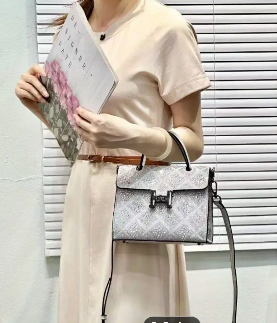 Swarovski crystal evening bag with B logo