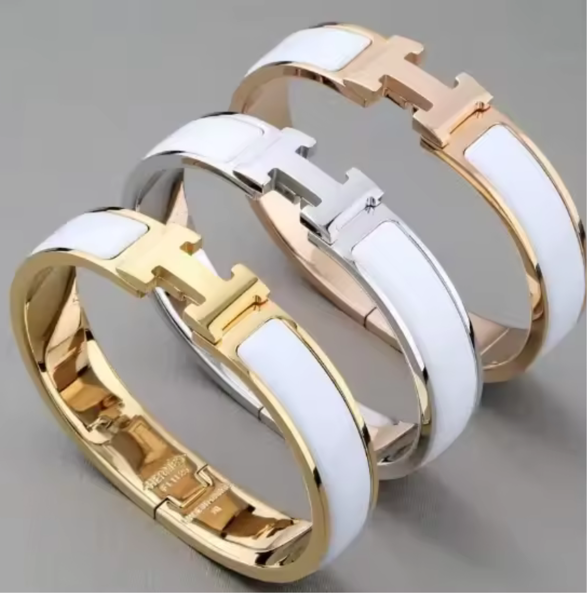 Thick band letter H bangle