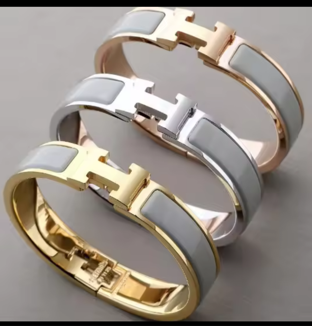 Thick band letter H bangle