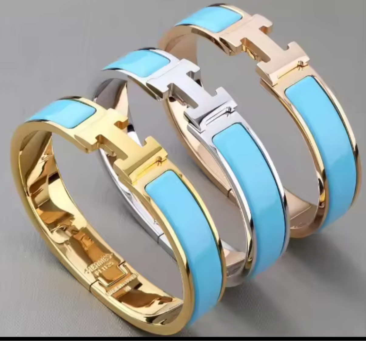 Thick band letter H bangle