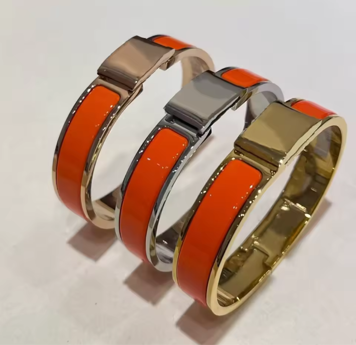 Thick band letter H bangle