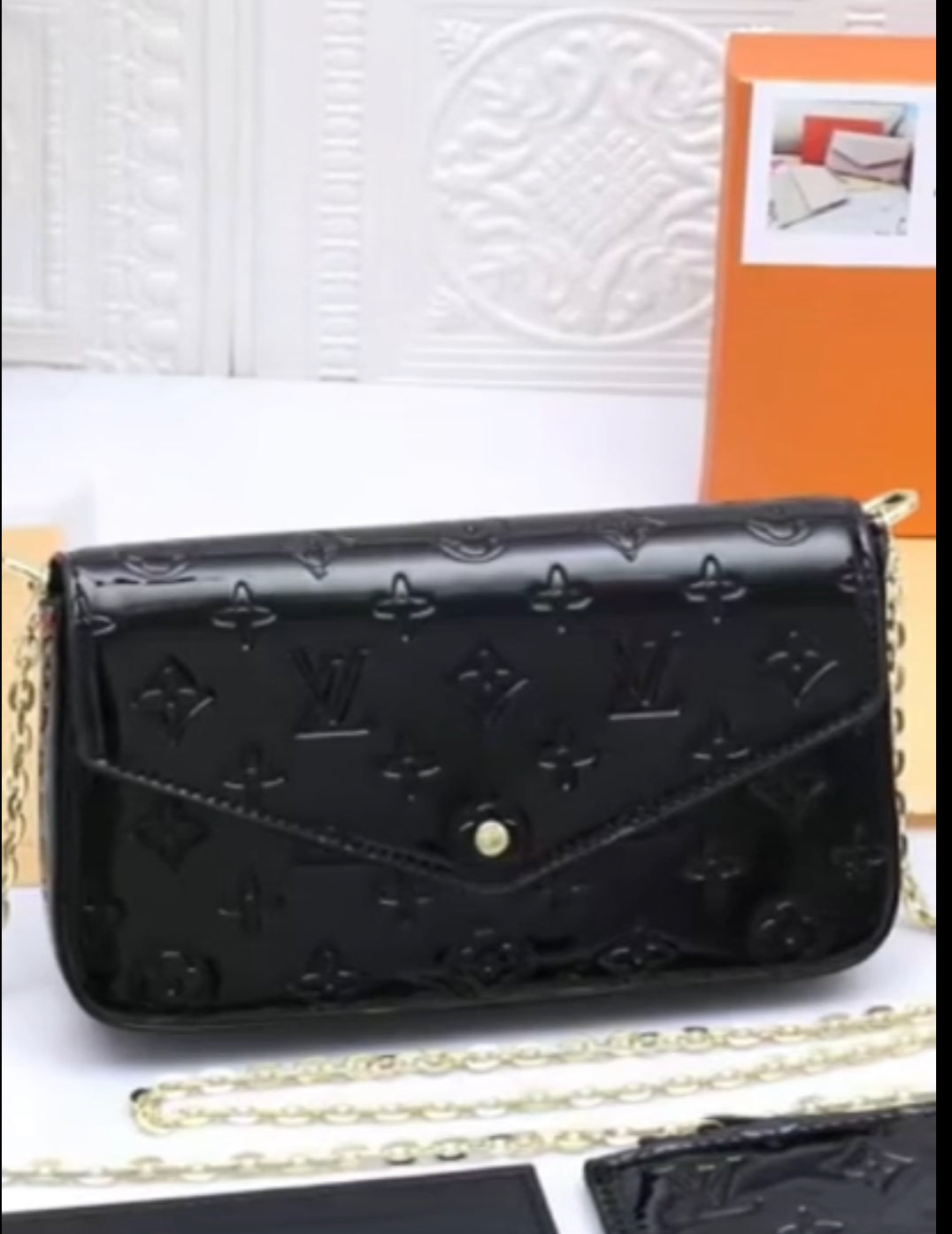 Small leather LV pouchette bag with chain and