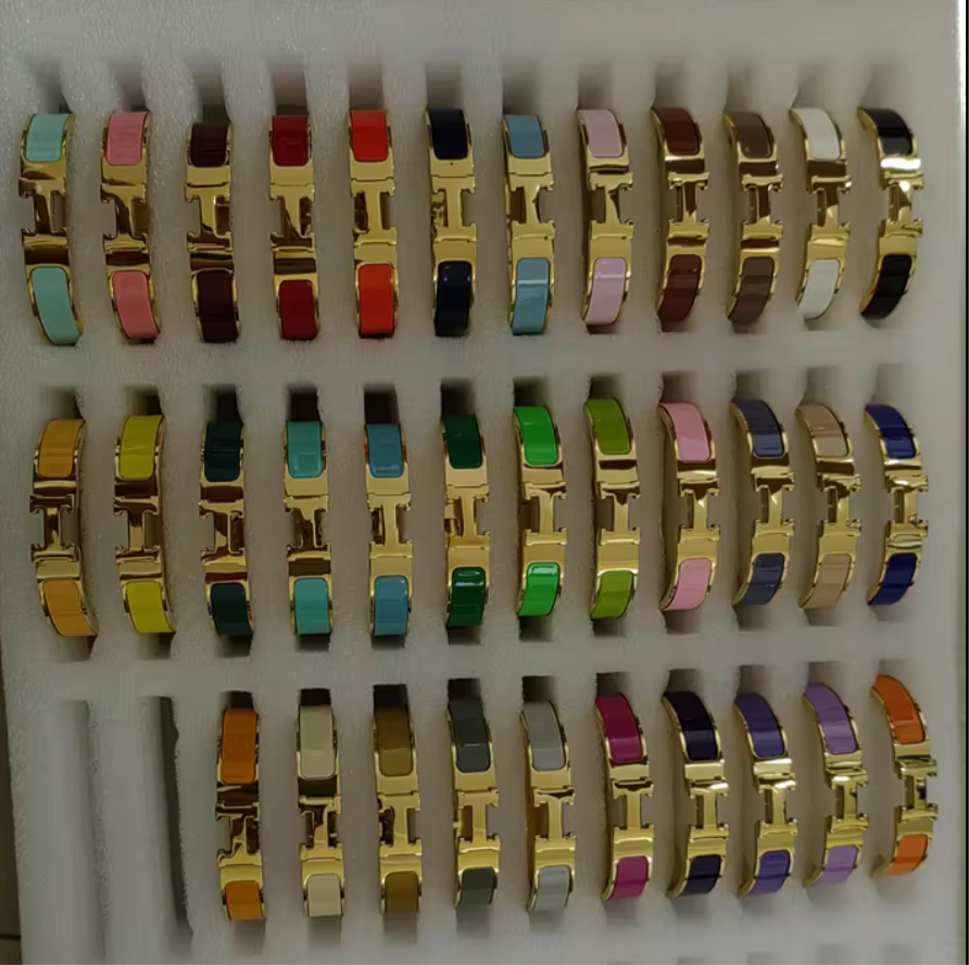 Thick band letter H bangle