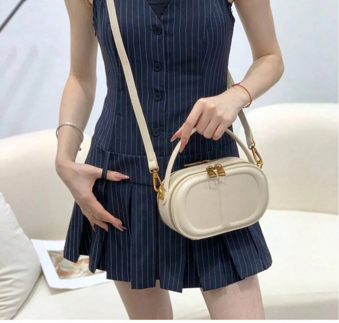 CD letter shapes cross body