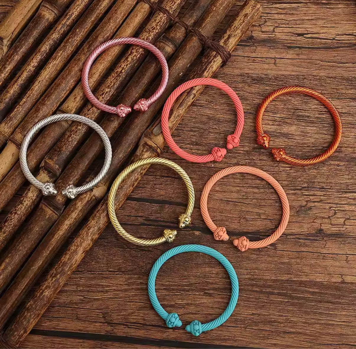 Various colored metal bangle bracelets