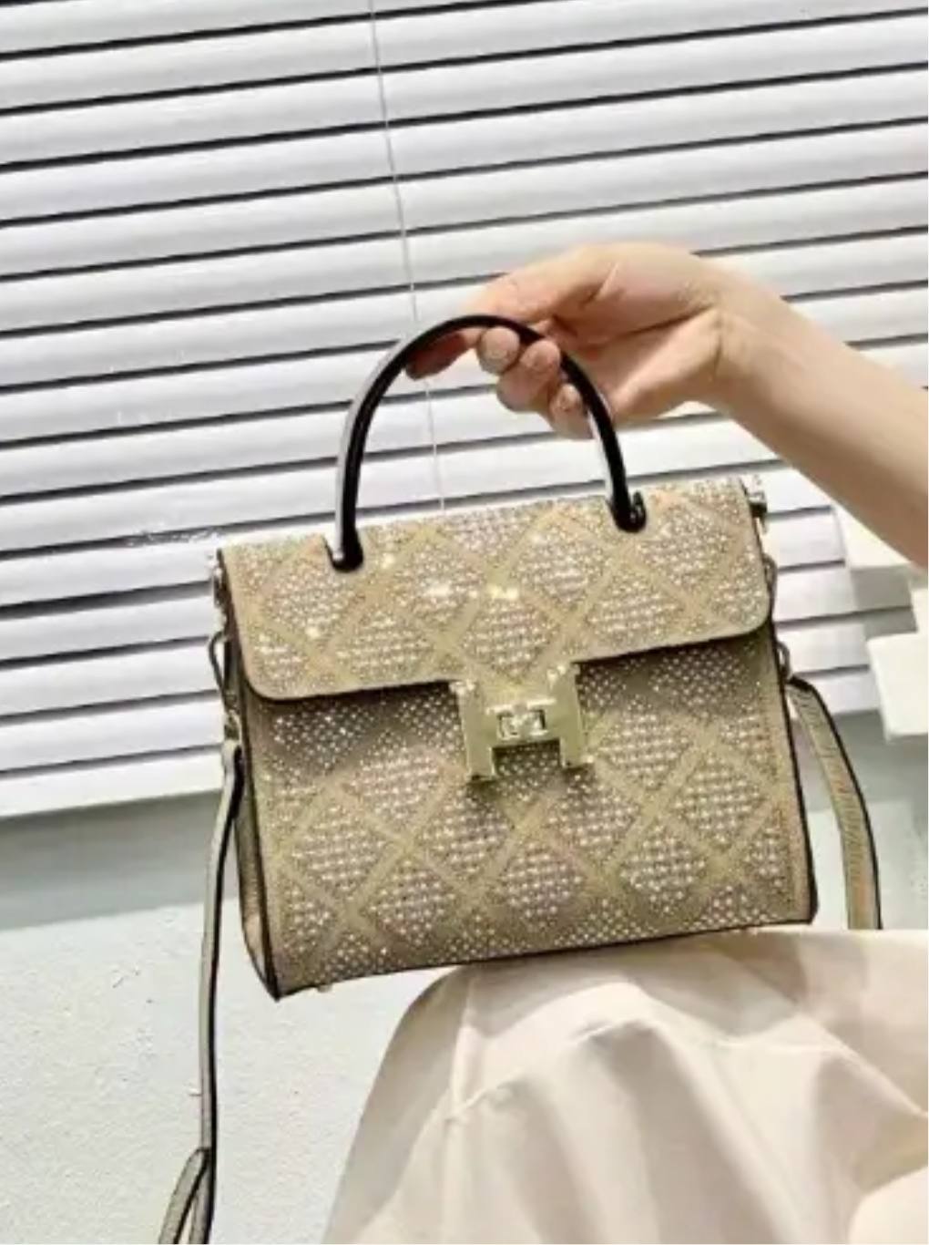 Swarovski Crystal H clutch.