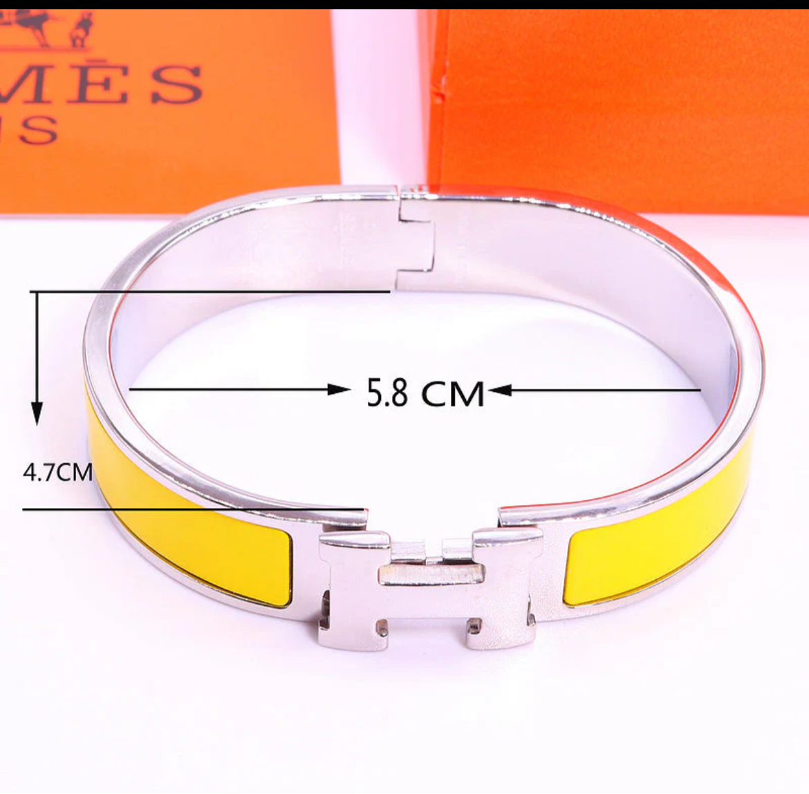 Thick band letter H bangle