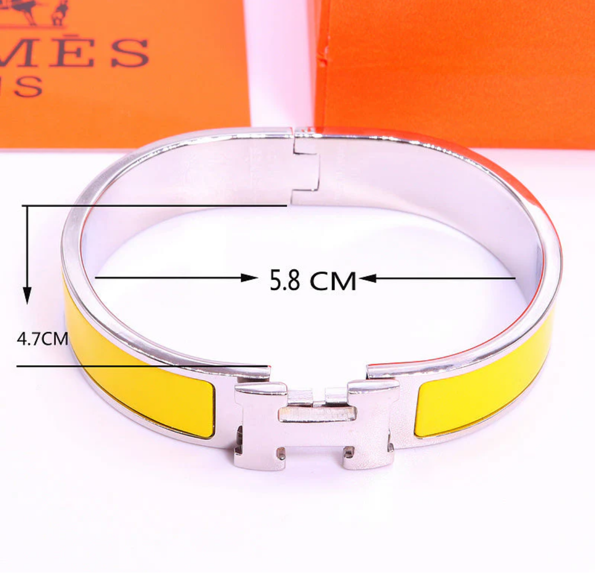 Thick band letter H bangle