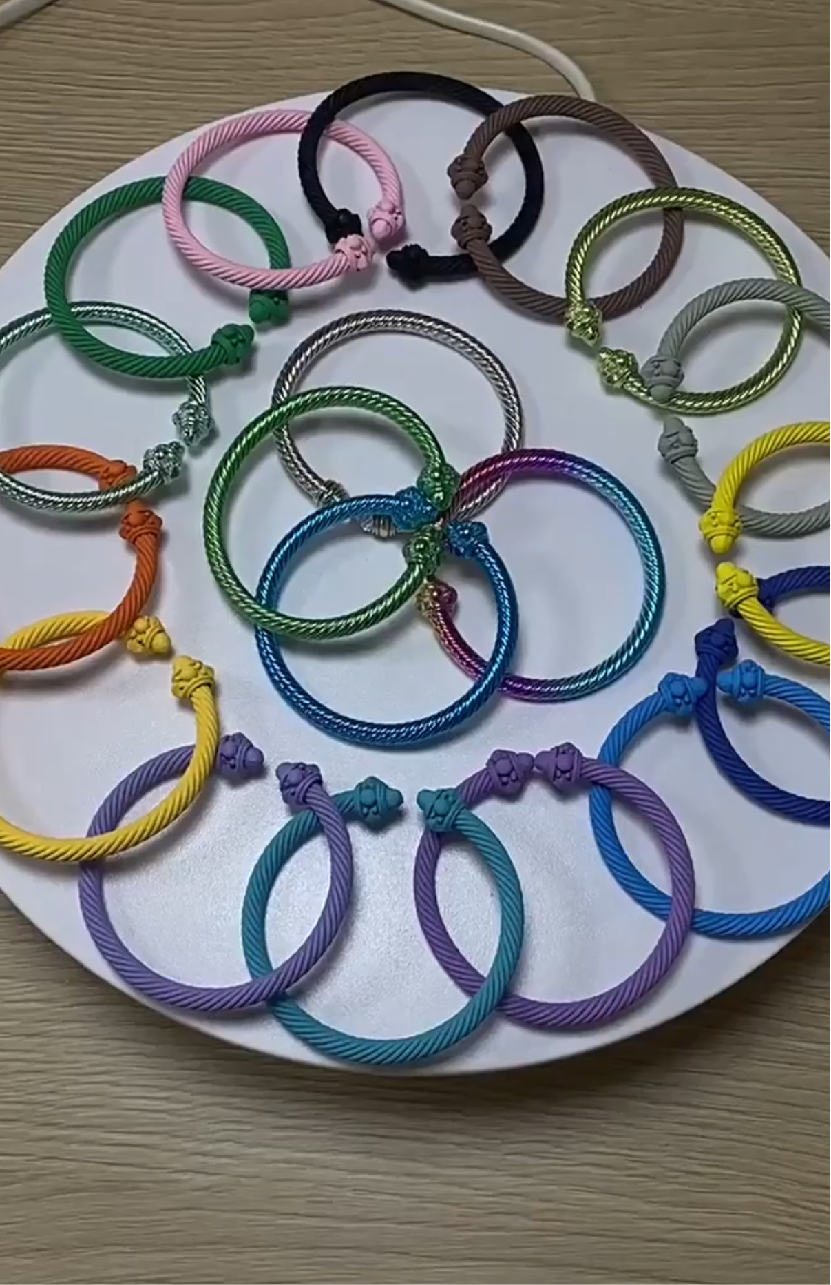Various colored metal bangle bracelets