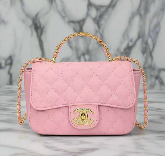 Top handle flap bag with cross body strap