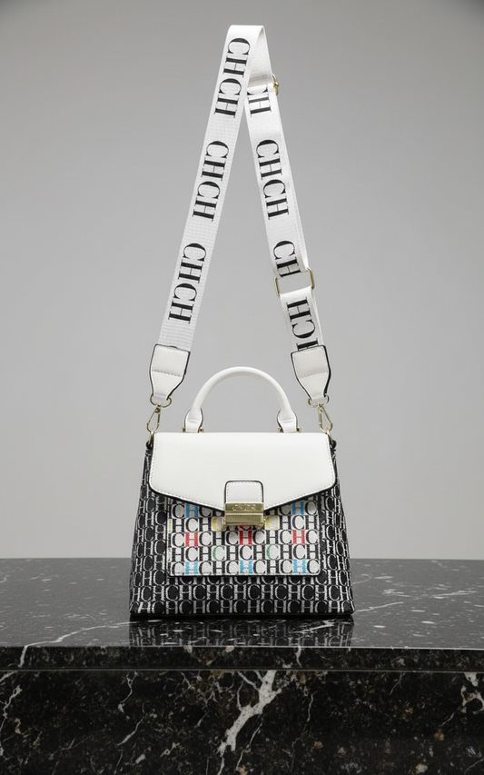 White handbag with a patterned strap on a white background