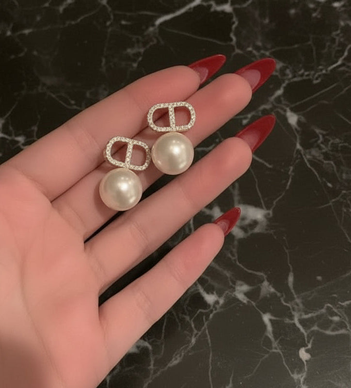 Assorted logo earrings and jewelry sets