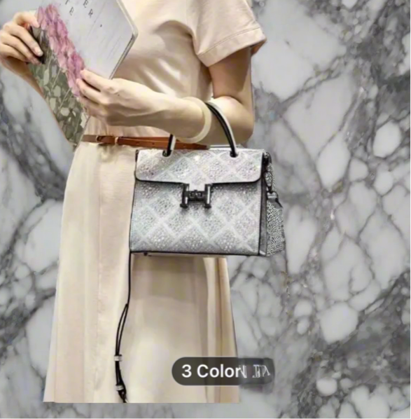 Swarovski crystal evening bag with B logo