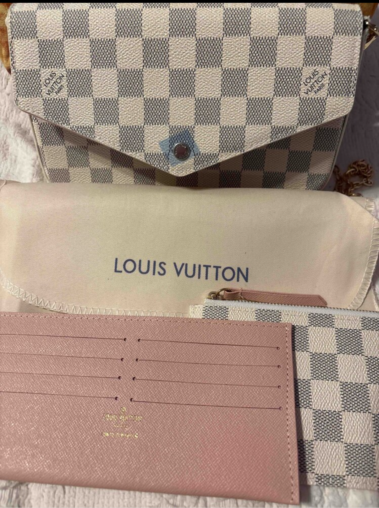 Small leather LV pouchette bag with chain and