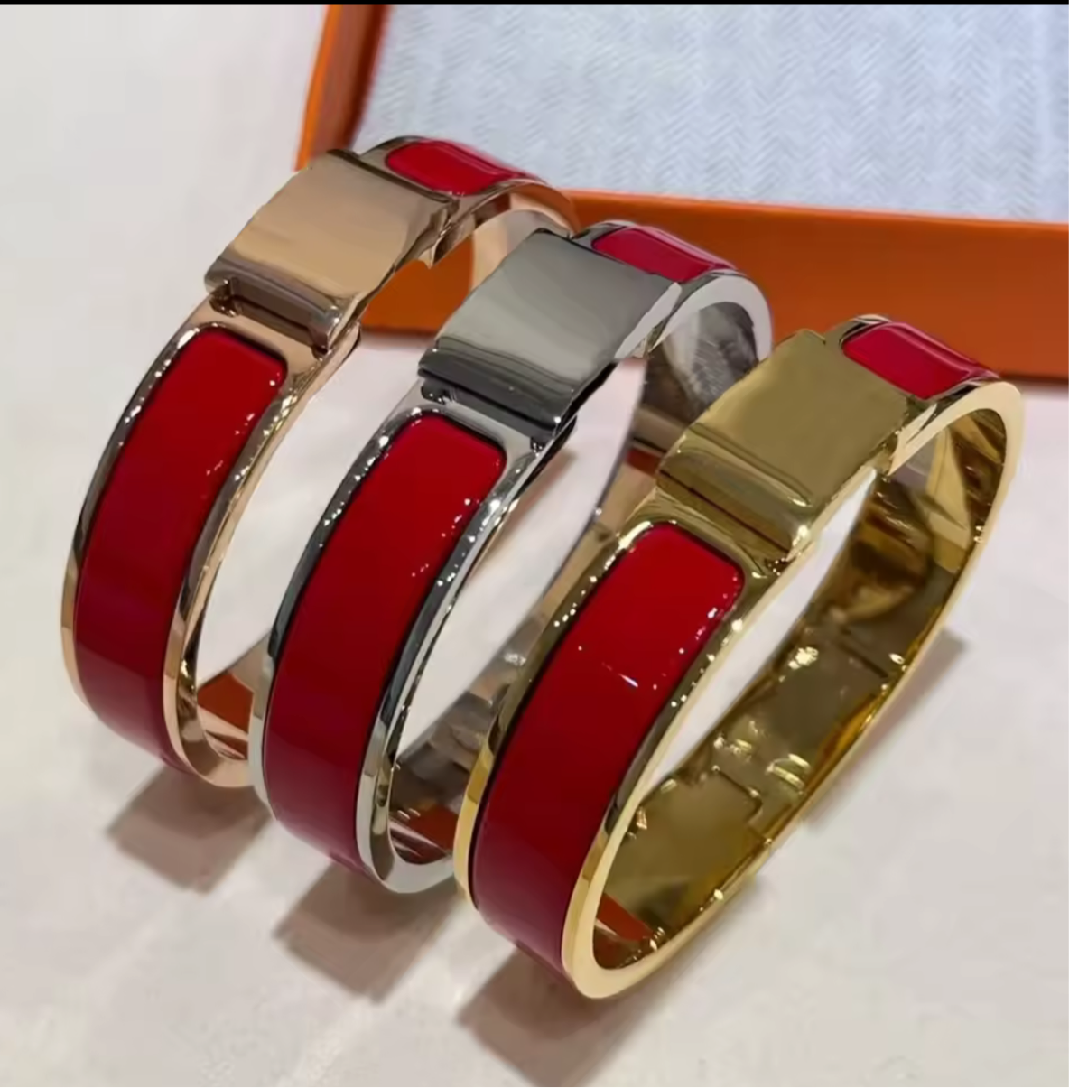 Thick band letter H bangle