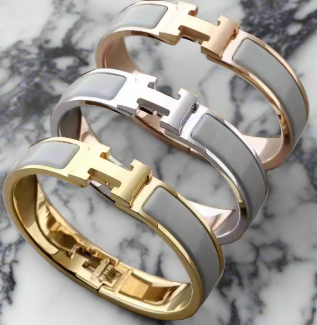 Thick band letter H bangle