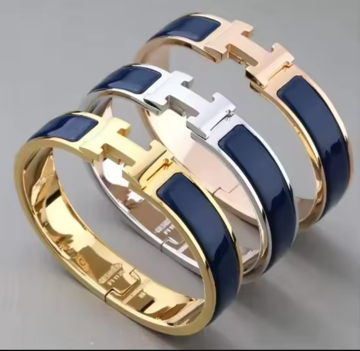 Thick band letter H bangle