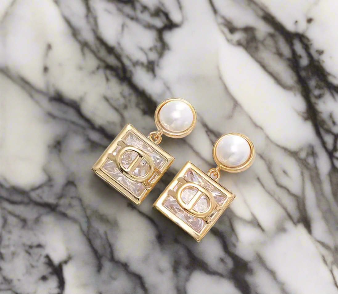 Dangling & pendant statement earrings