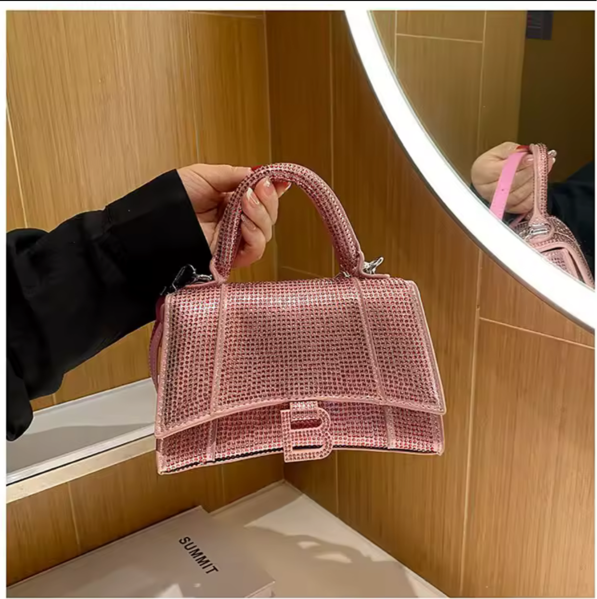 Swarovski crystal evening bag with B logo