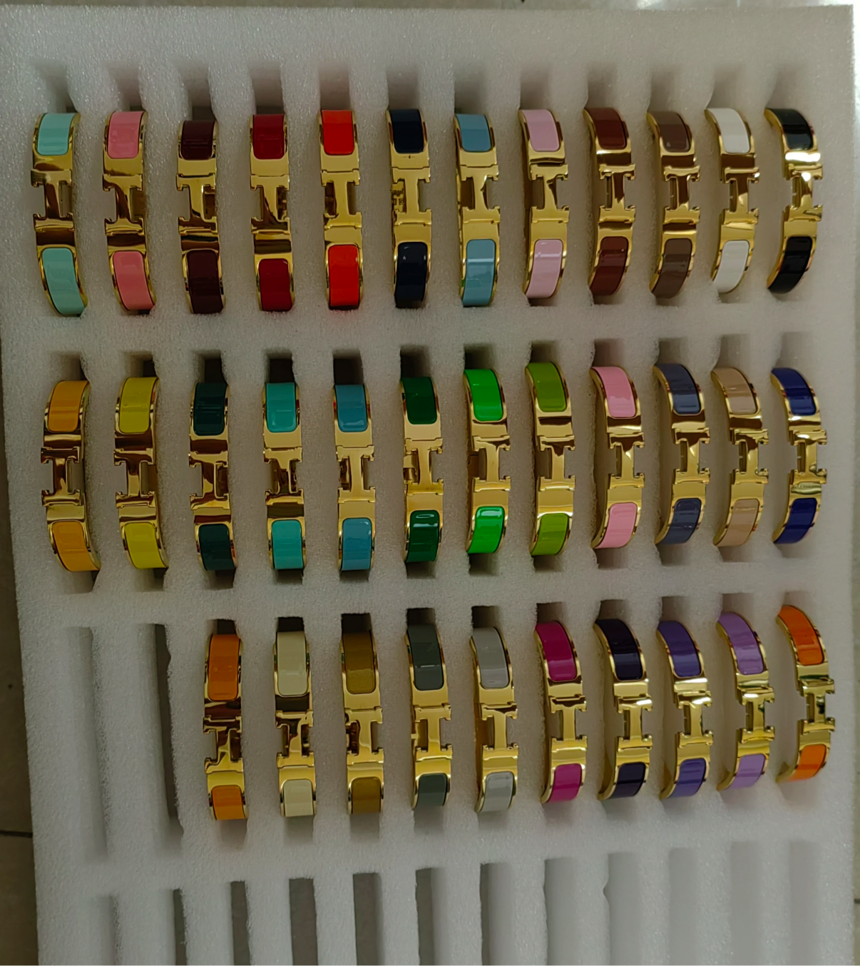 Thick band letter H bangle