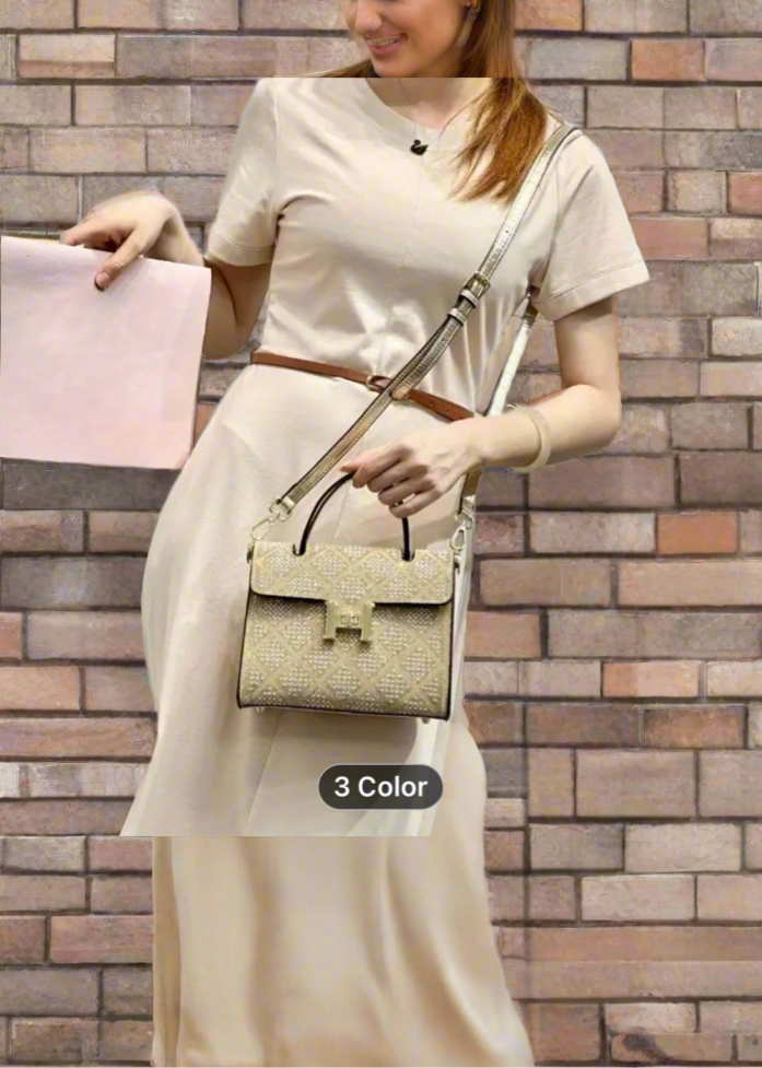 Swarovski crystal evening bag with B logo