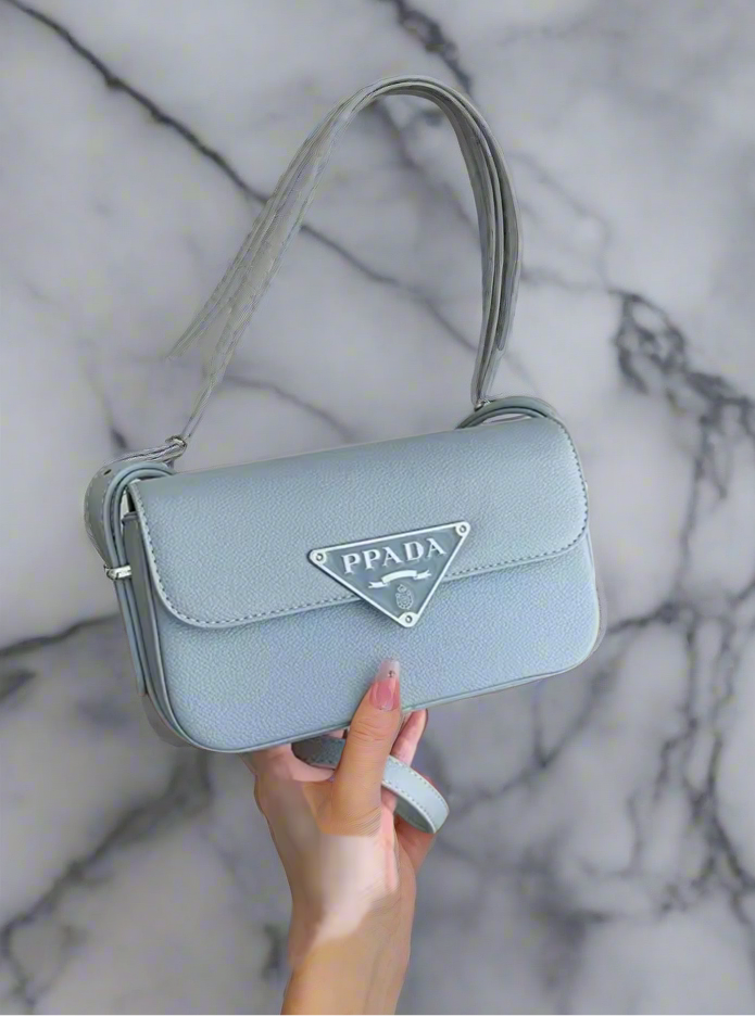 Small colorful crossbody flap bags with triangle logo snap closure