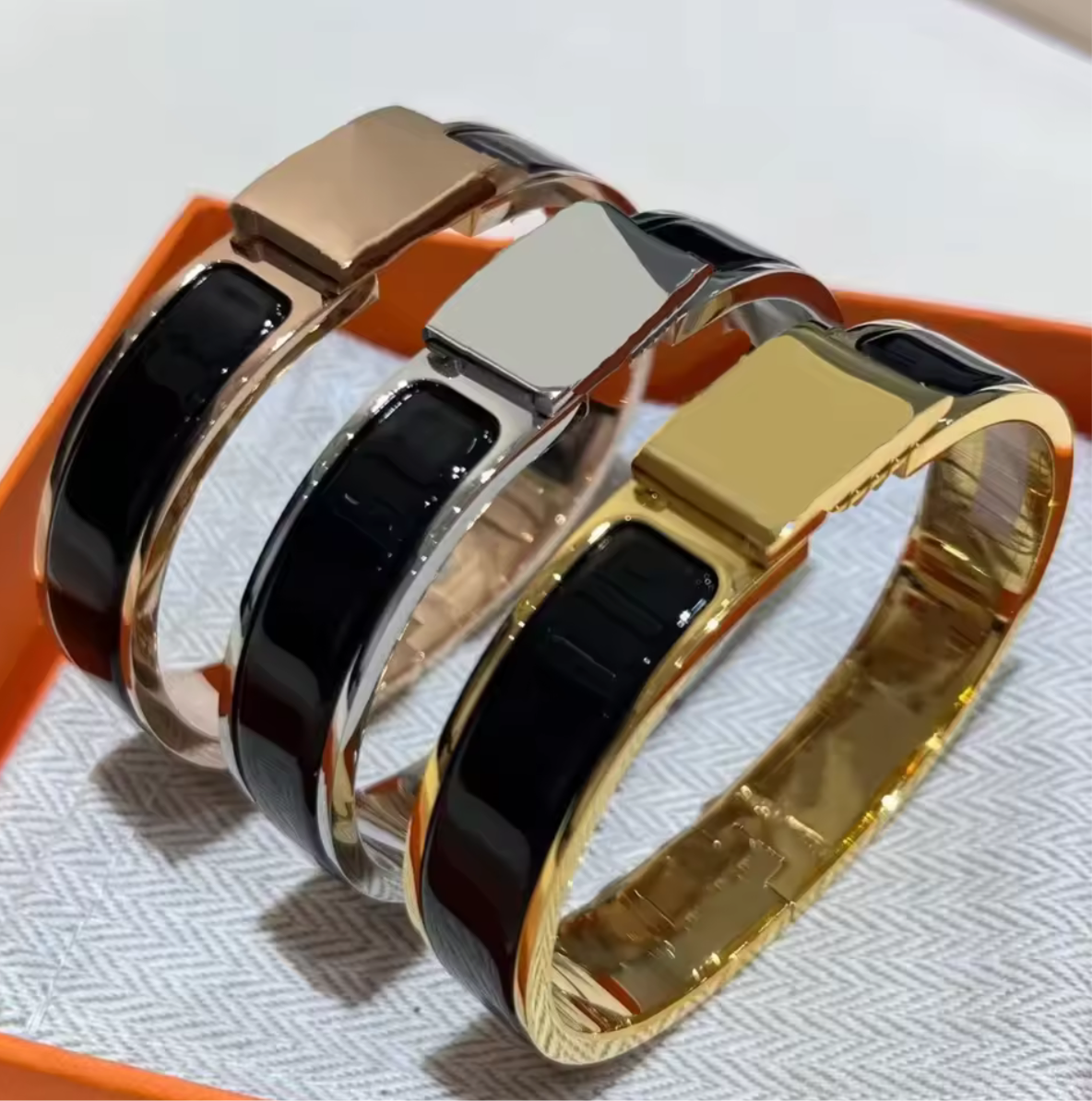 Thick band letter H bangle