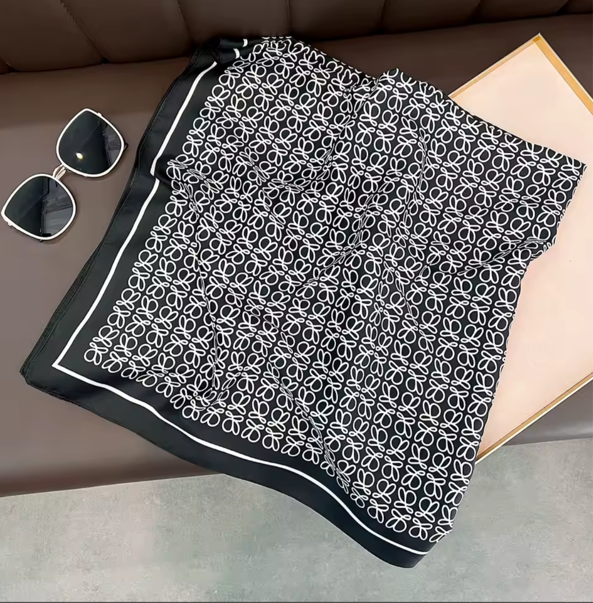 Thin Light weight, black scarf w/ small white L design   