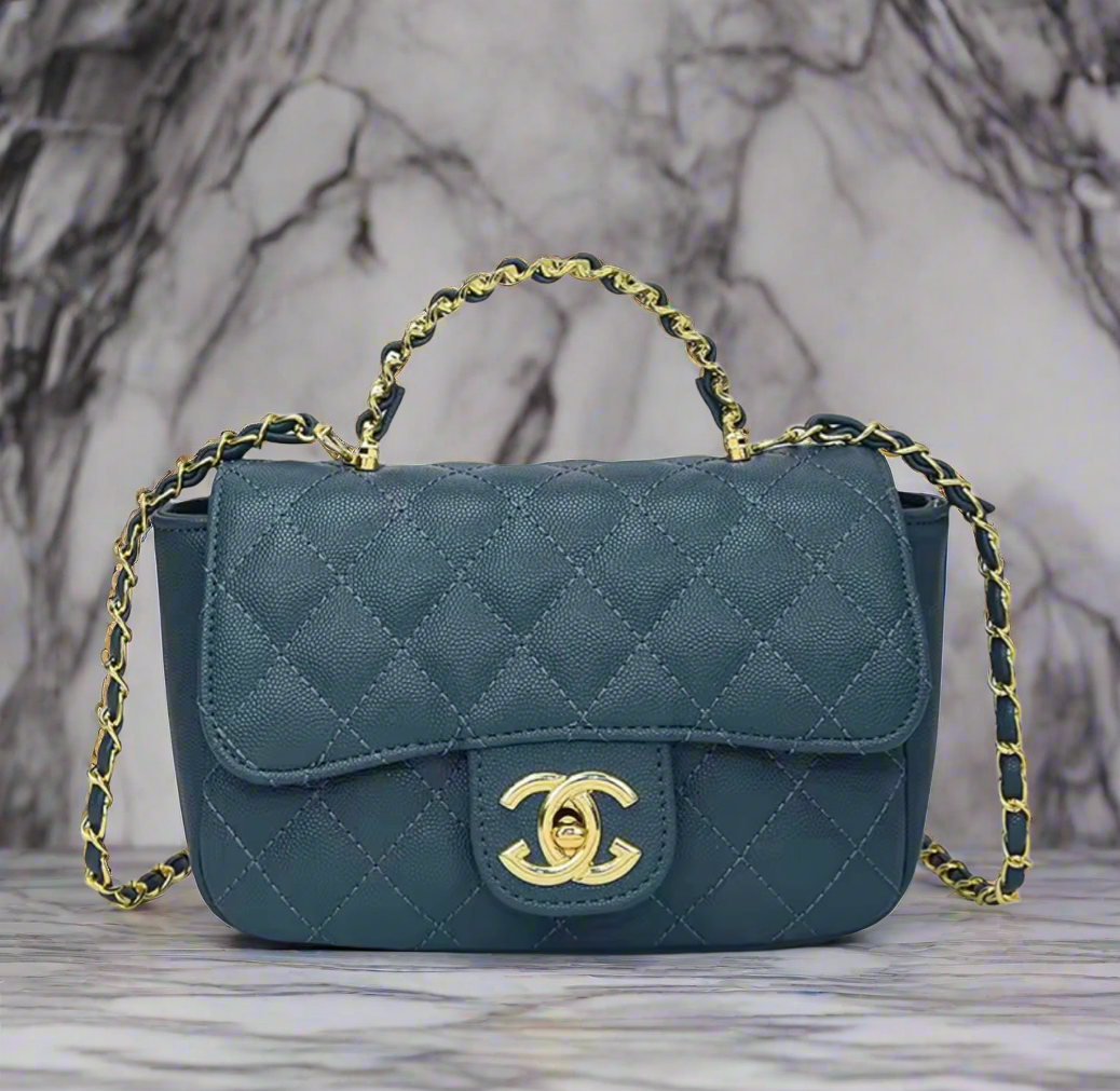 Top handle flap bag with cross body strap