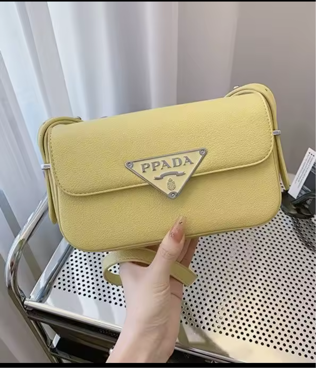 Small colorful crossbody flap bags with triangle logo snap closure