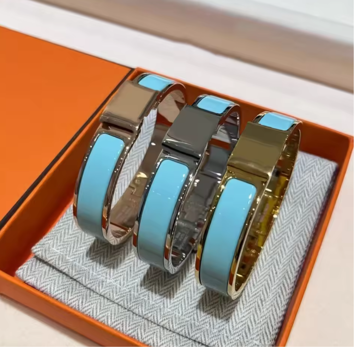 Thick band letter H bangle