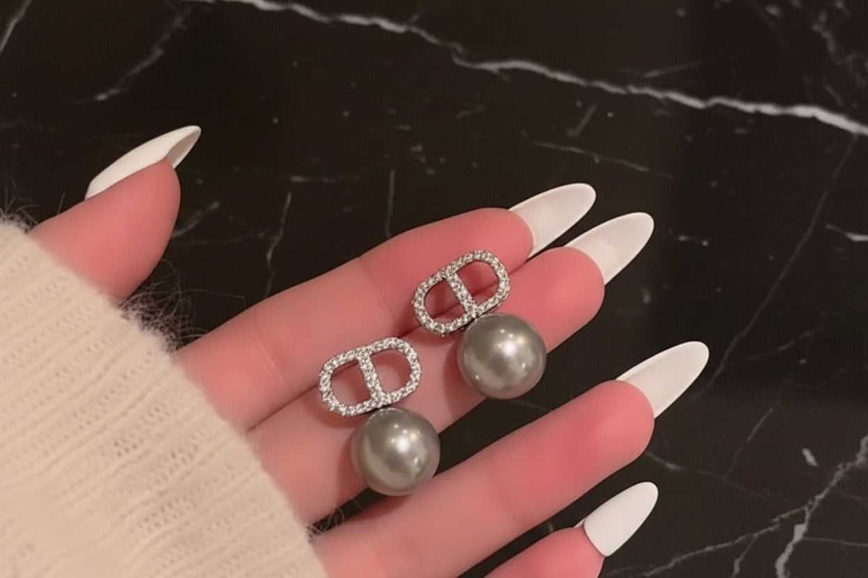Assorted logo earrings and jewelry sets