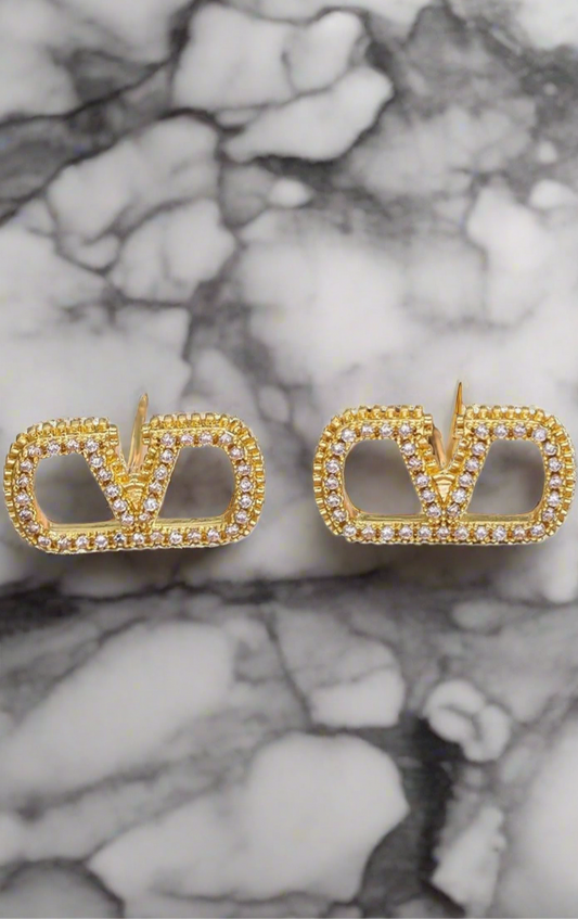 Assorted logo earrings and jewelry sets