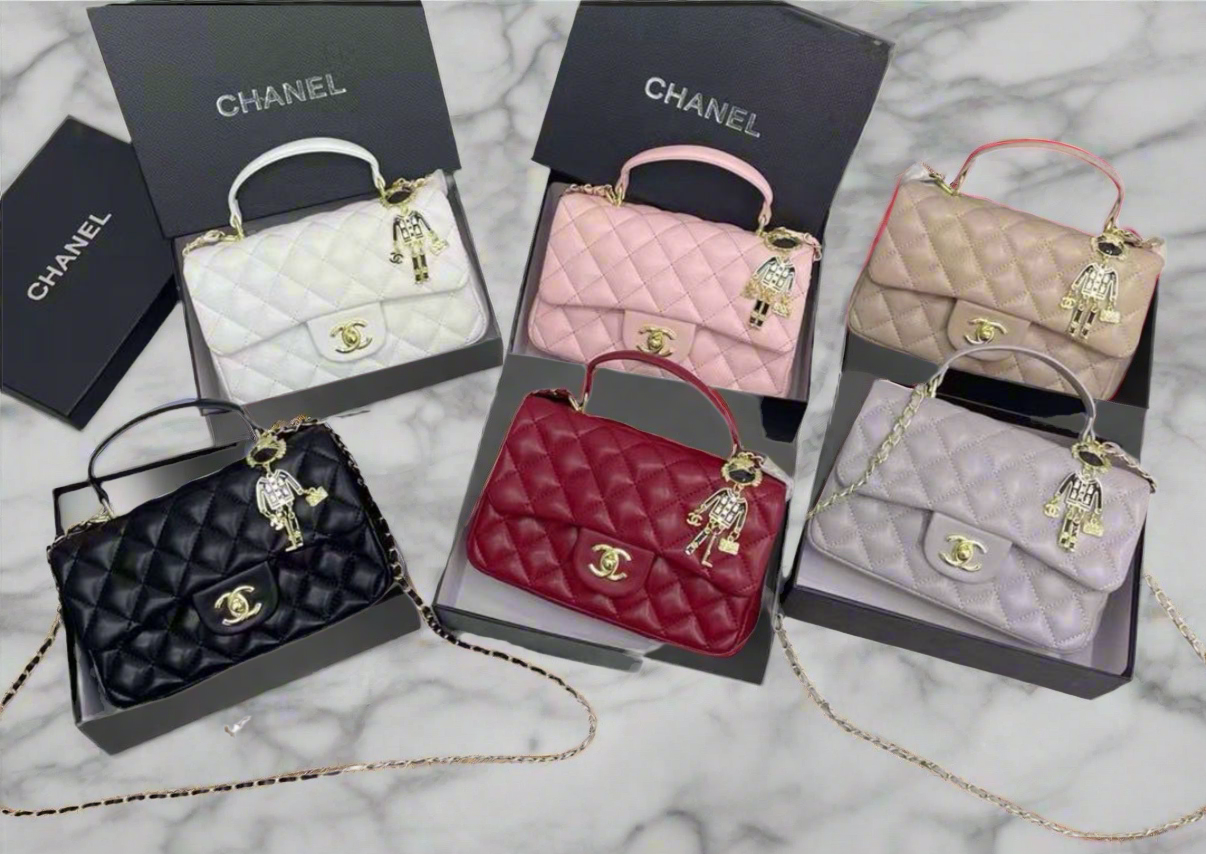 Top handle flap bag with cross body strap