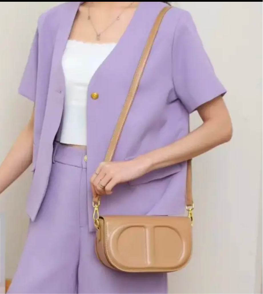 CD letter shapes cross body