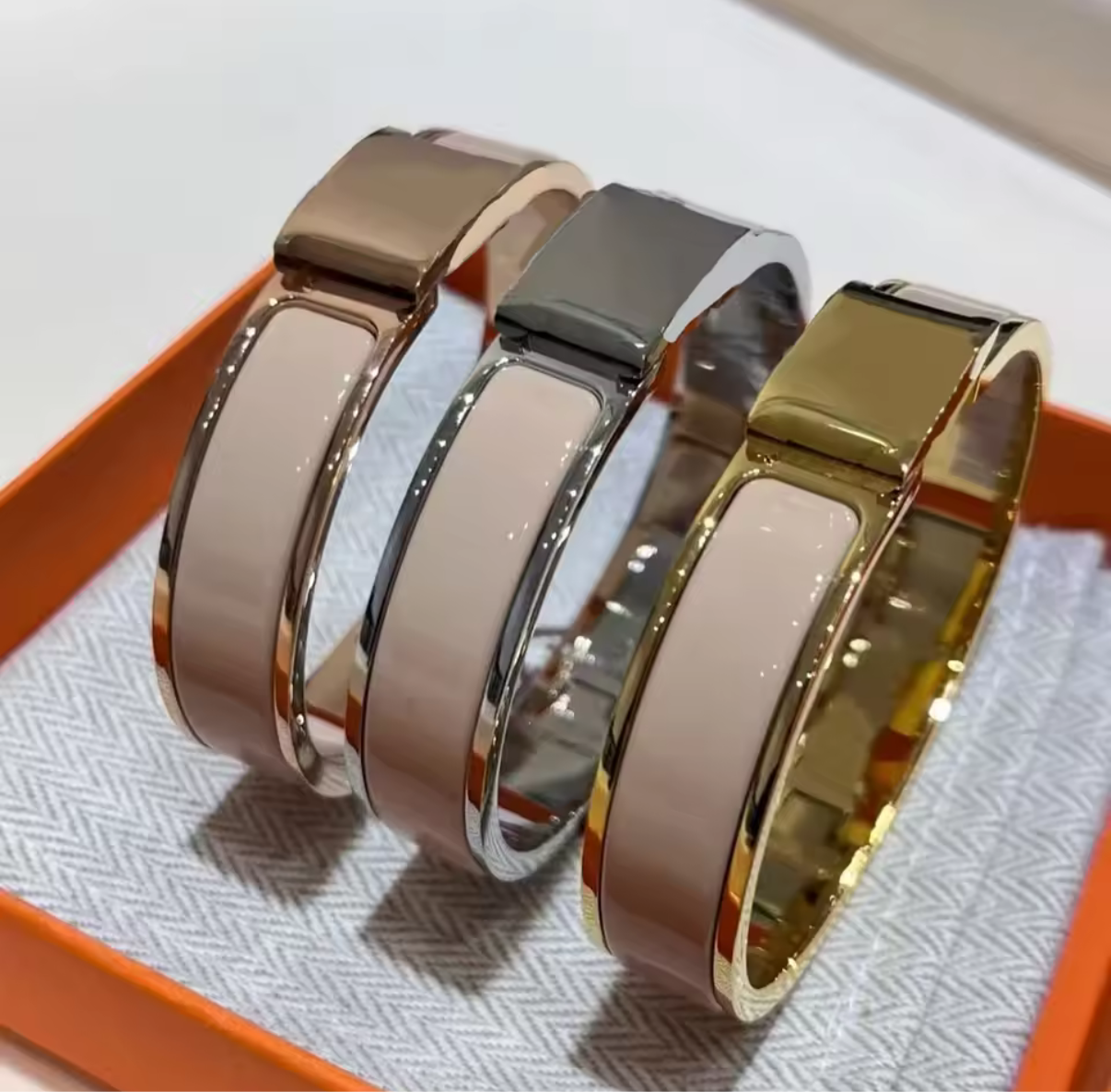 Thick band letter H bangle