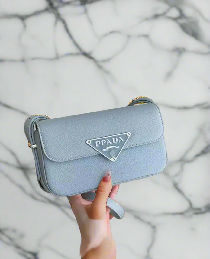 Small colorful crossbody flap bags with triangle logo snap closure