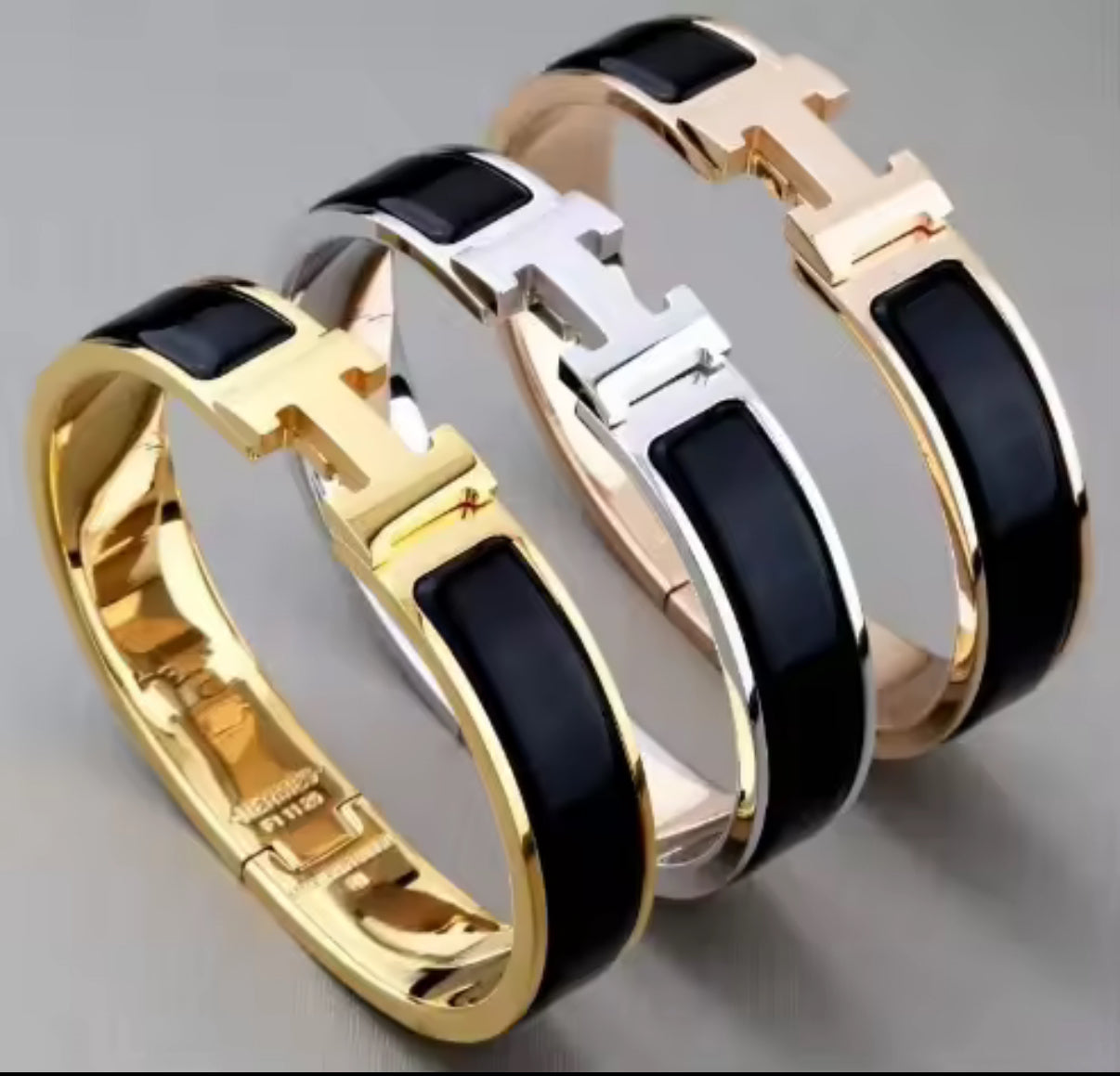 Thick band letter H bangle