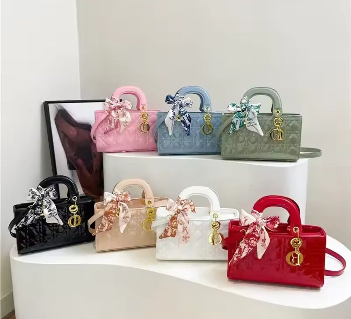 Shiny quilted rectangular tote bag with double handles.  