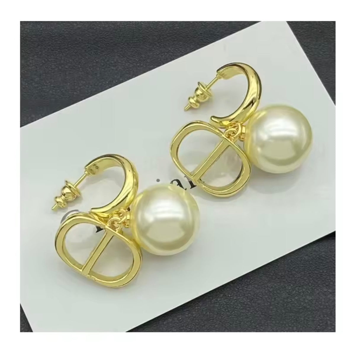 Assorted logo earrings and jewelry sets